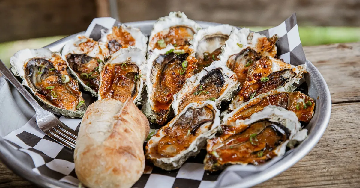 Drive, Ferry, or Swim If You Must to Reach Washington State's Outdoor Oyster Saloon